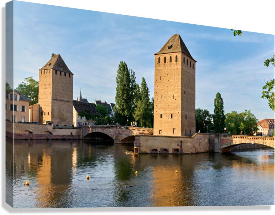 Exploring covered bridges in Strasbourg on a clear day