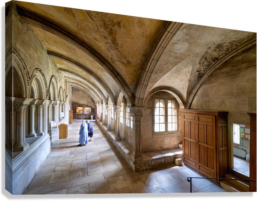 Nun walking in the cloister of Vezelay Abbey in Bourgogne France