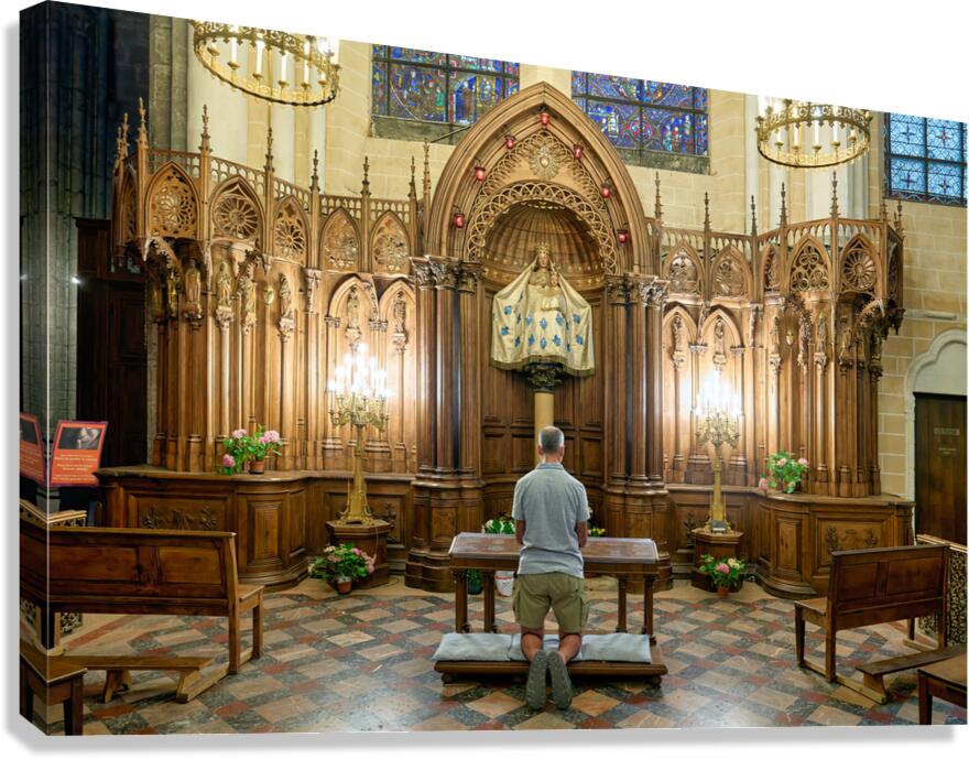 Praying in a chapel at Chartres Cathedral in France