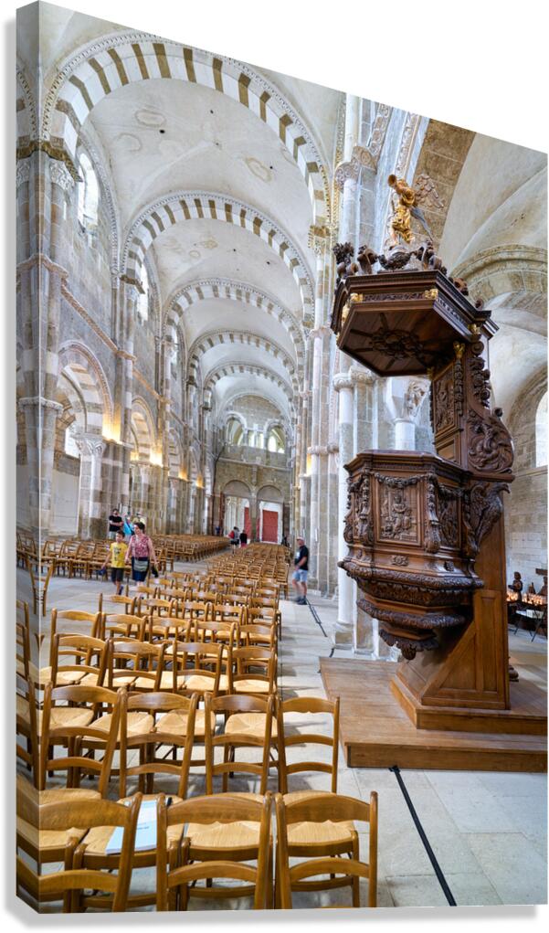 Visitors explore the interior of Vezelay Abbey in Bourgogne Fra