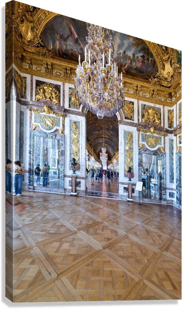 Visitors explore the historic halls of Versailles in Paris Fran