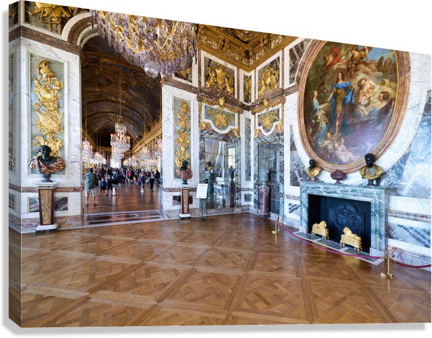 Visitors explore the halls of the Palace of Versailles in France
