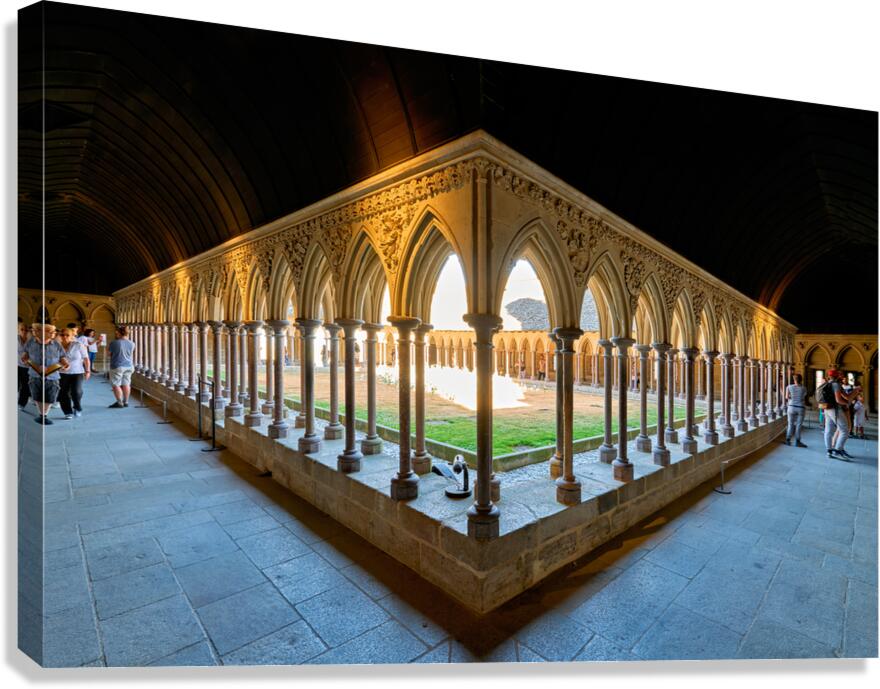 Exploring the cloister at Mont Saint Michel abbey in Normandy Fr