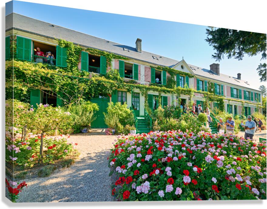 Visitors admire Monets house and garden in Giverny Normandy Fra