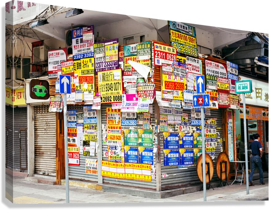 Real estate signs on a street corner in Hong Kong