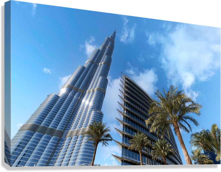Burj Khalifa among modern buildings and palm trees in Dubai