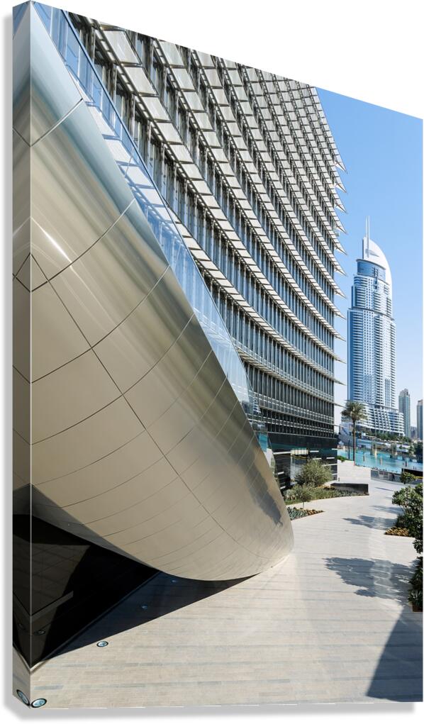 Modern architecture in Dubai with curved building and skyscraper