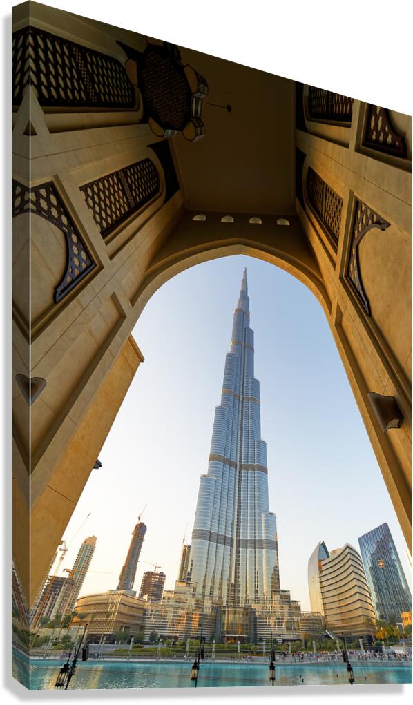 Burj Khalifa seen through ornate arch in Dubai cityscape