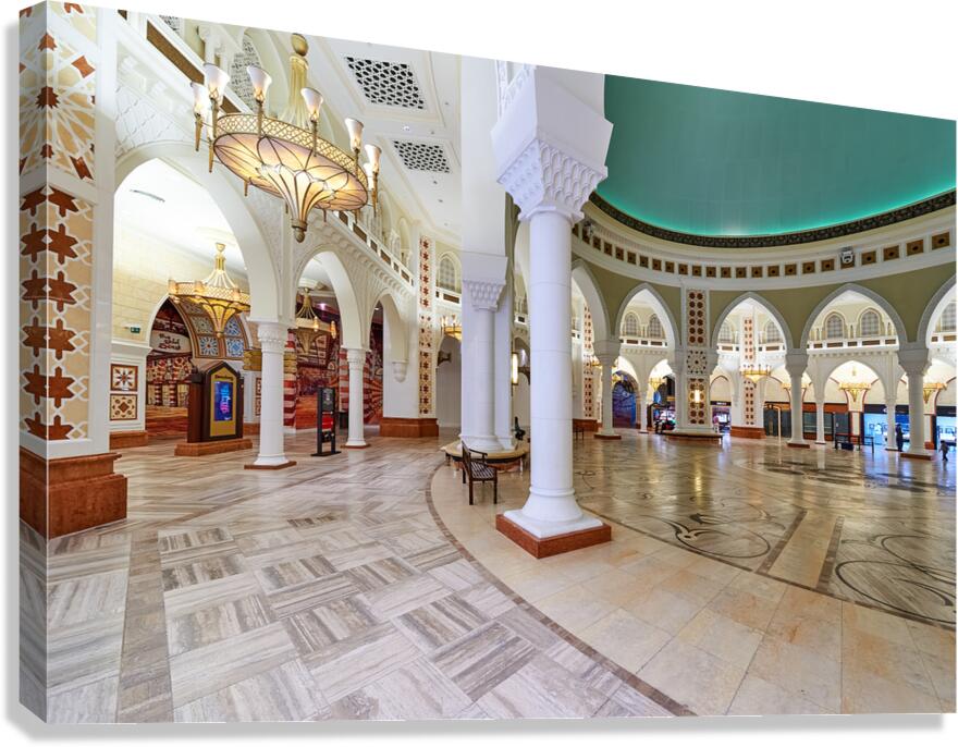 Ornate Middle Eastern interior with arches and chandeliers in Du