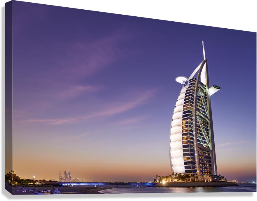 Burj Al Arab hotel standing tall in Dubai at twilight time