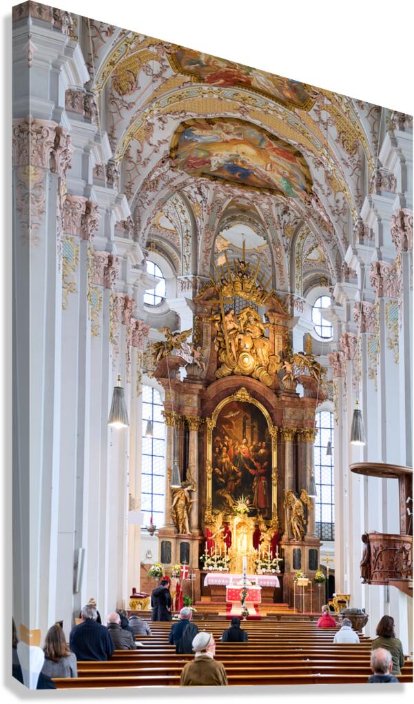 Visitors gather inside Heilig Geist Kirche in Munich during serv