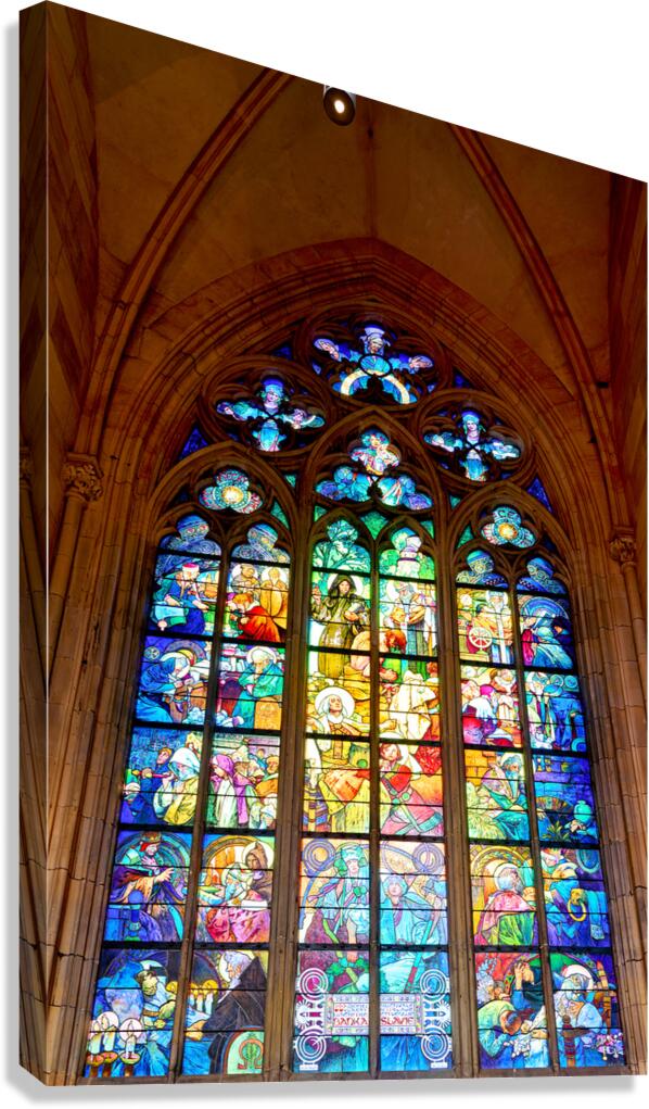 Vibrant stained glass window depicting religious figures and sce
