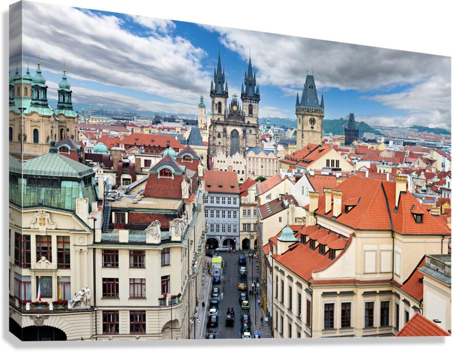 Pragues historic cityscape: spires red roofs and bustling str