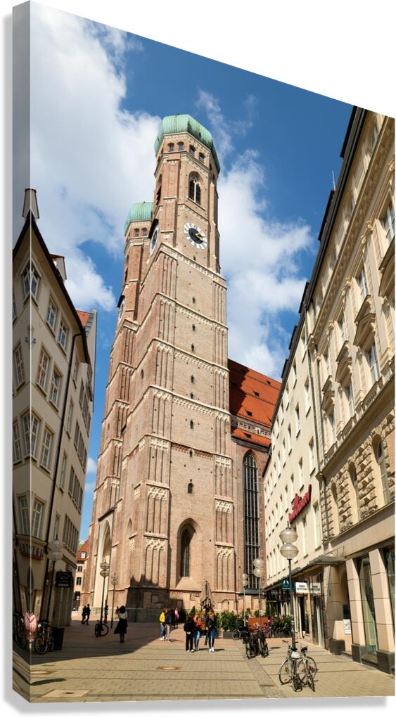 Visitors at Frauenkirche in Munich under a clear sky