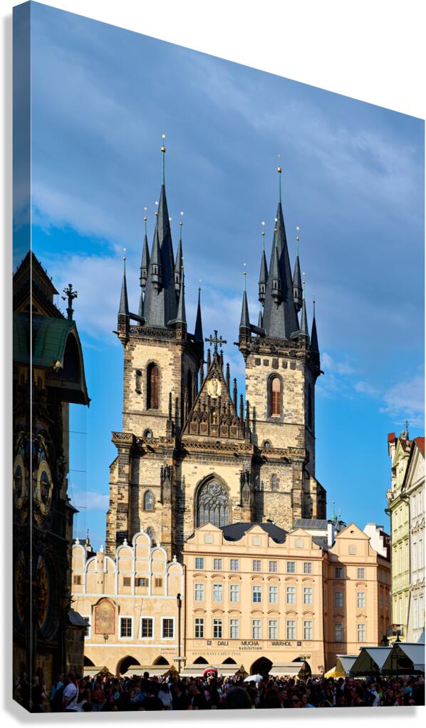 Pragues Týn Church towers over Old Town Square crowd.