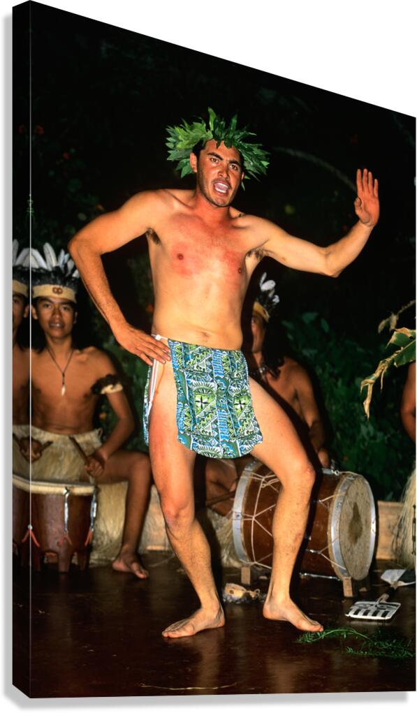Man performs traditional dance on Easter Island during night eve
