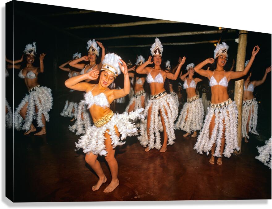 Women perform traditional dance in feathered costumes on Easter 