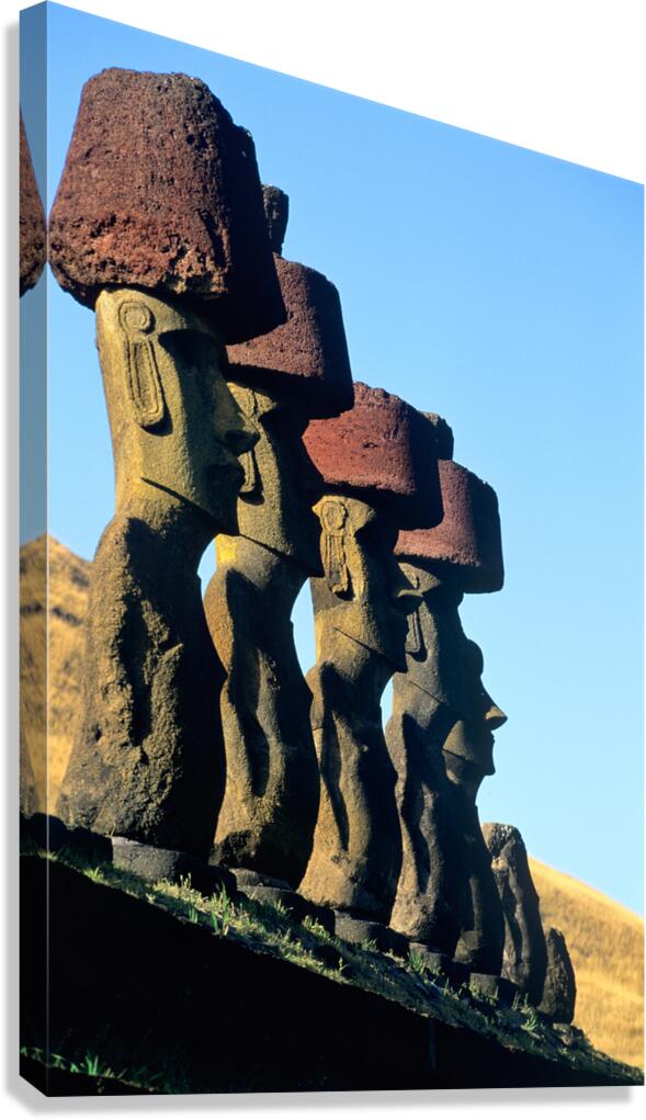 Moai statues with red topknots on Easter Island.
