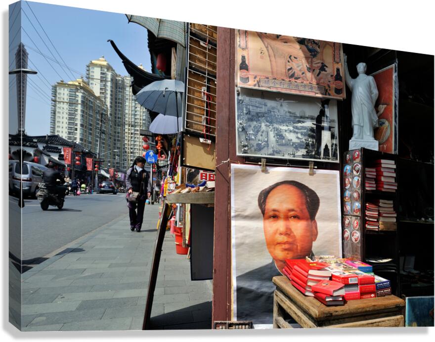 Street stall in Shanghai sells Mao posters and red books