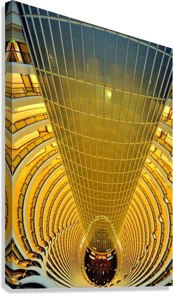 Shanghai grand hotel atrium has curved balconies and glass ceili