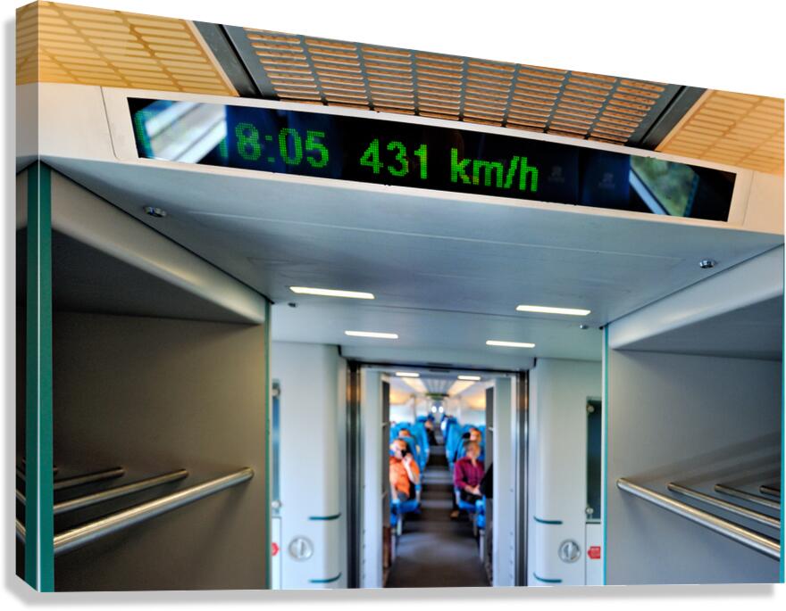 High speed train interior showing speed readout in Shanghai