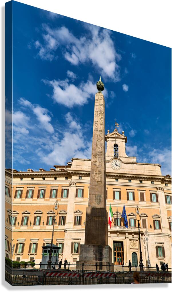 Montecitorio Palace in Rome with an obelisk under a blue sky