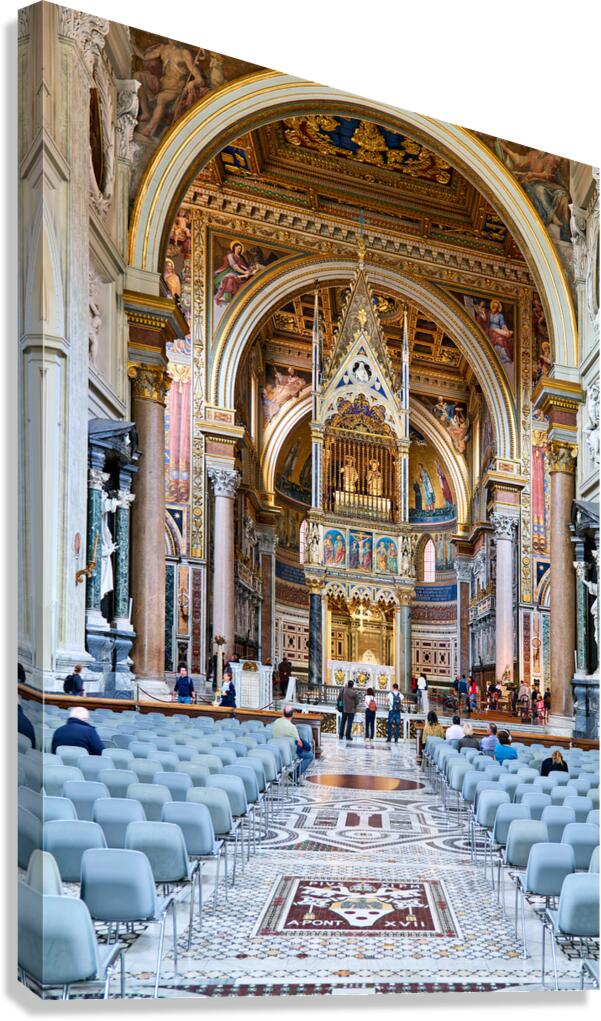 Visitors explore the Archbasilica Cathedral in Rome Italy