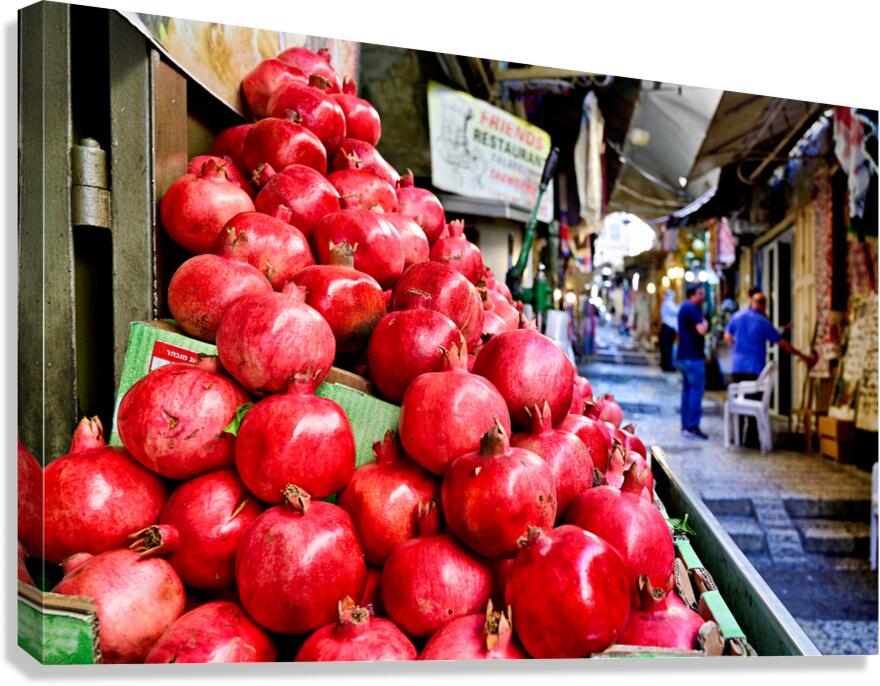 Fresh fruit stall in old city of Jerusalem with red pomegranates