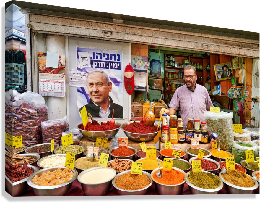 Market scene in Mahane Yehuda with spices and local vendor
