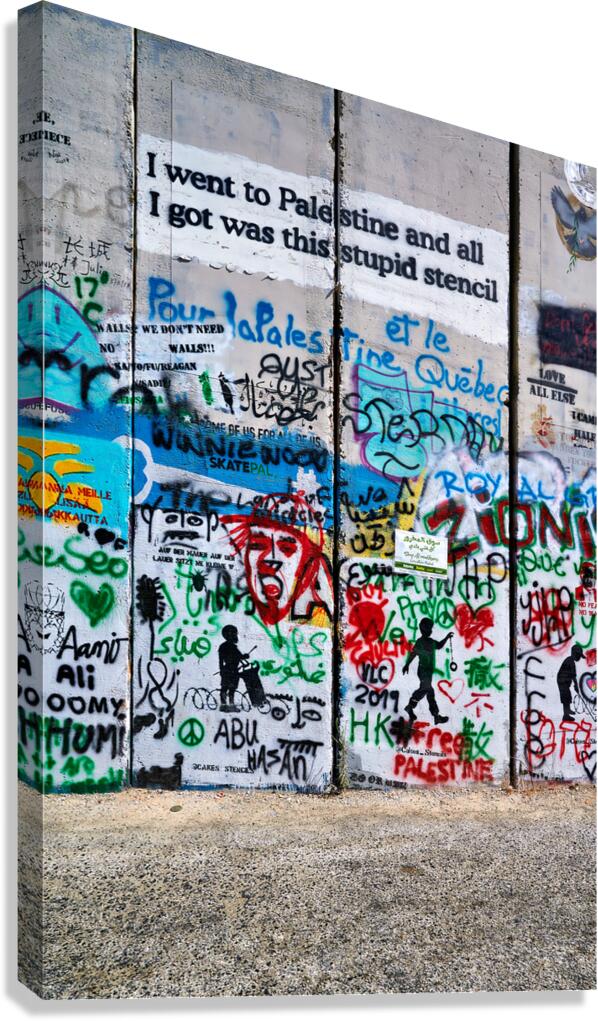 Wall art shows messages on the separation wall in Bethlehem
