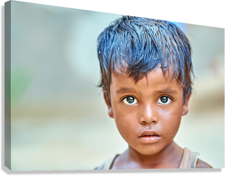 Portrait of a boy in Rajasthan India with a focused expression