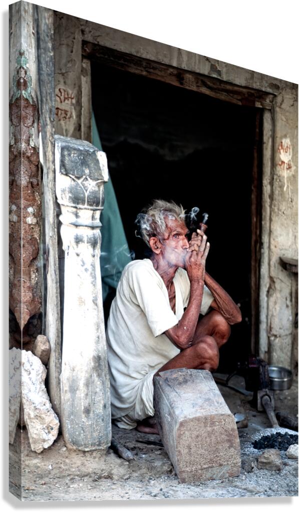 Man smoking hashish in Jaipur Rajasthan during the day