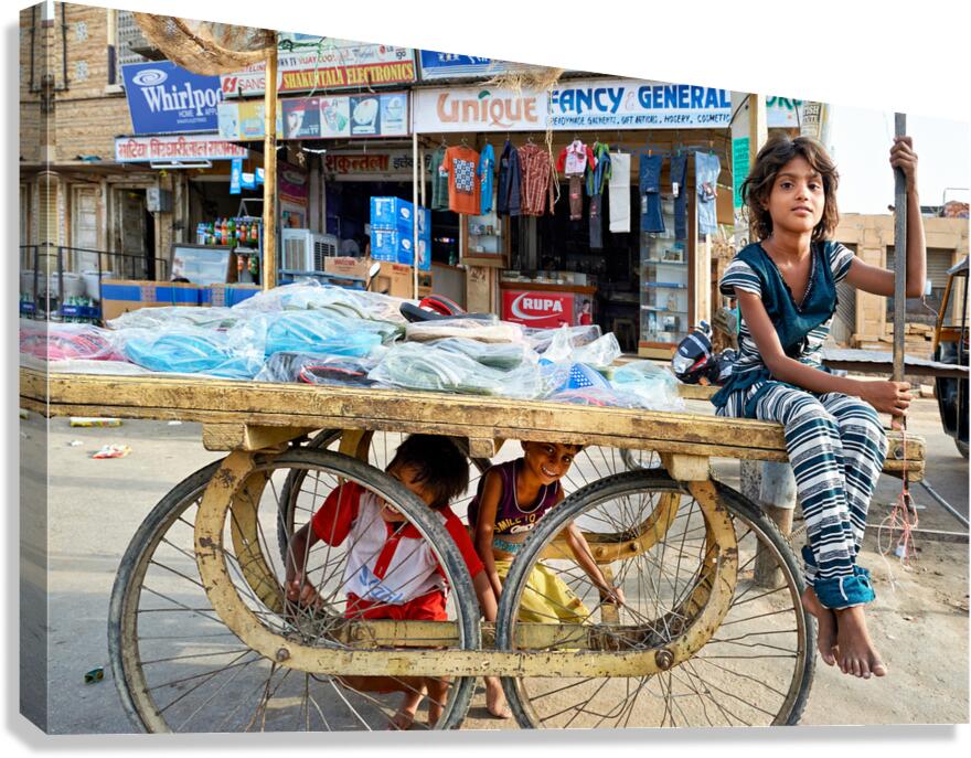 Children playing on a cart in Jaisalmer Rajasthan India