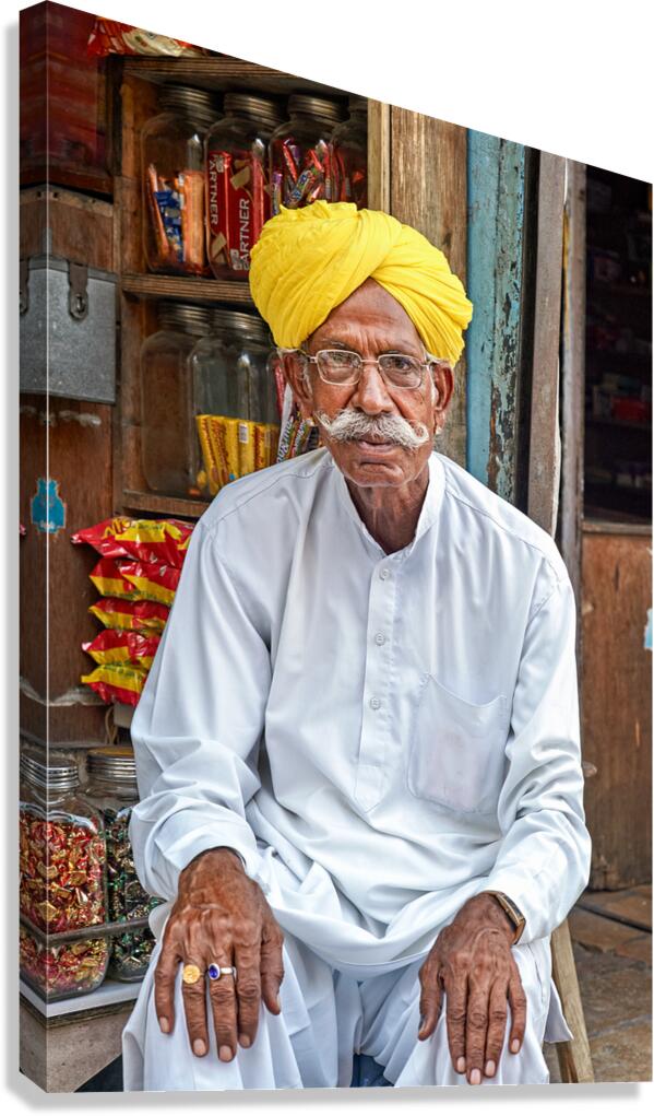 Senior man sitting in Jaisalmer market in Rajasthan India