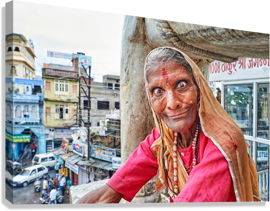 Woman poses for a picture on a balcony in Udaipur Rajasthan