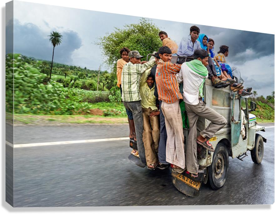Many people travel on a loaded vehicle in Rajasthan India