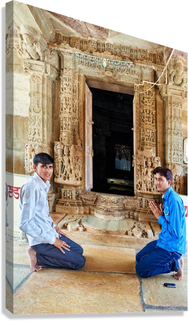 Visitors pray at a temple entrance in Chittorgarh Fort