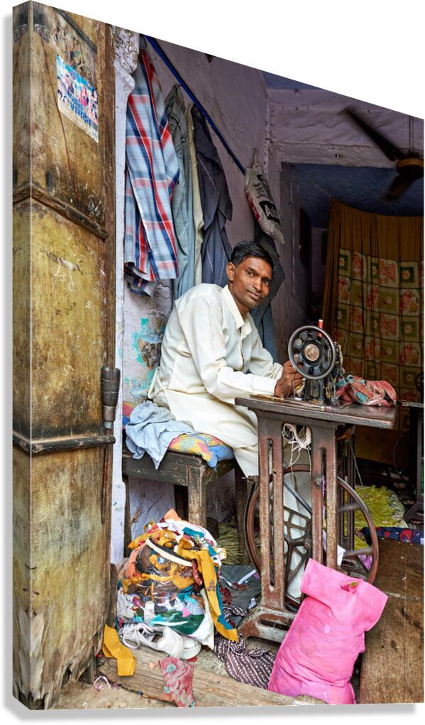Man sewing clothes in Bundi Rajasthan during the day