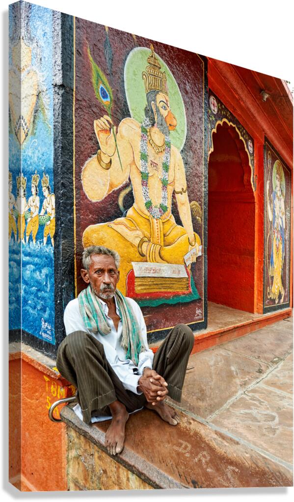 Old man sitting in Bundi Rajasthan near wall paintings