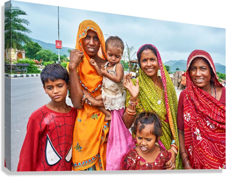 Women and children in vibrant clothes at Amber Rajasthan India