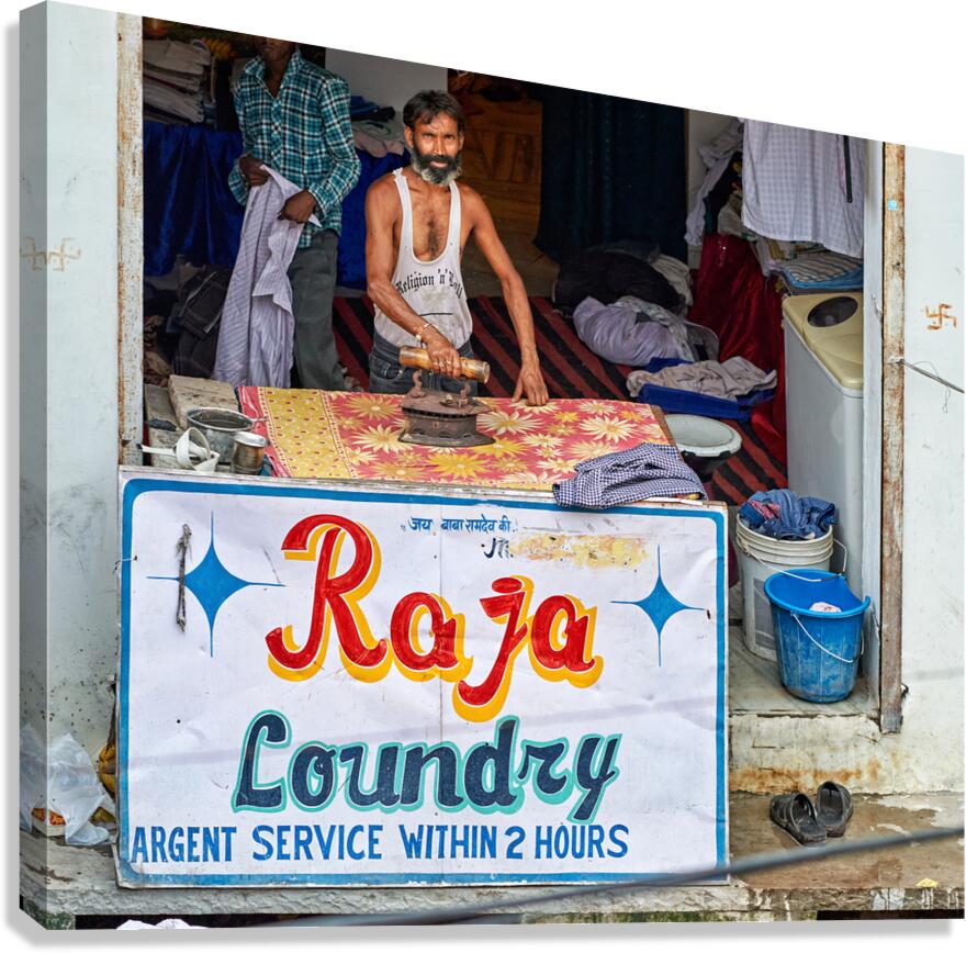 Ironing clothes at Raja Laundry in Bundi Rajasthan