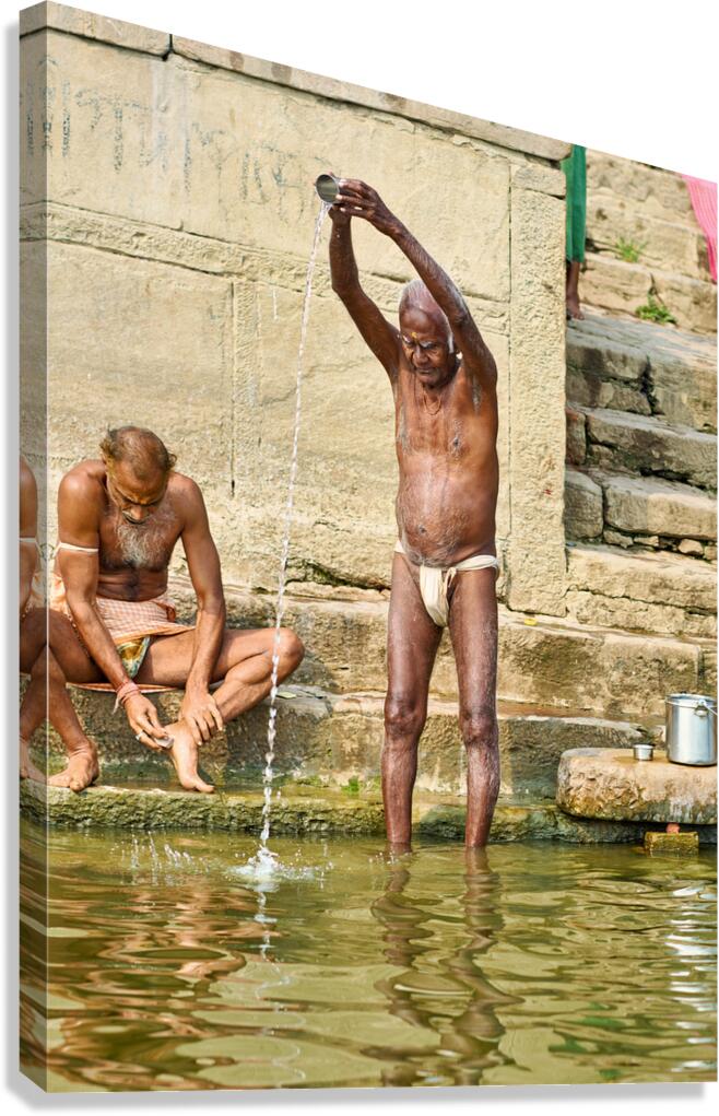 Sacred ablutions at the Ganges river in Varanasi Uttar Pradesh