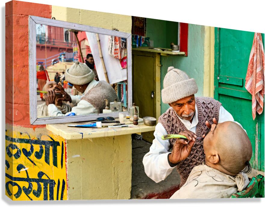 Barber provides shaving service in Varanasi Uttar Pradesh