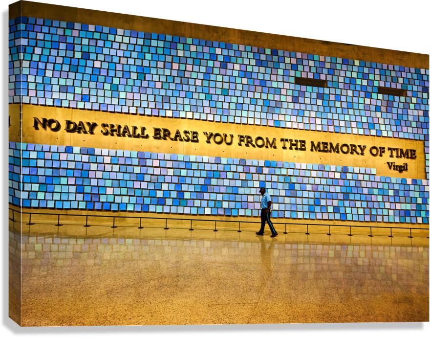 Visitors walk by art display at National September 11 Memorial M