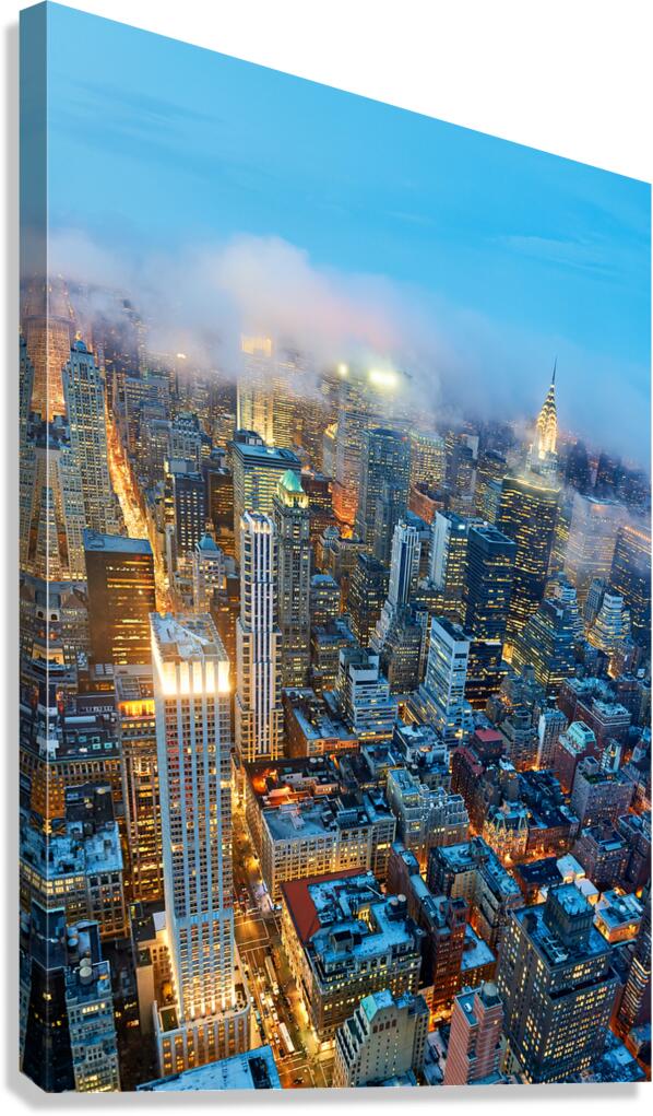Dusk view of Manhattan showing city lights and skyscrapers