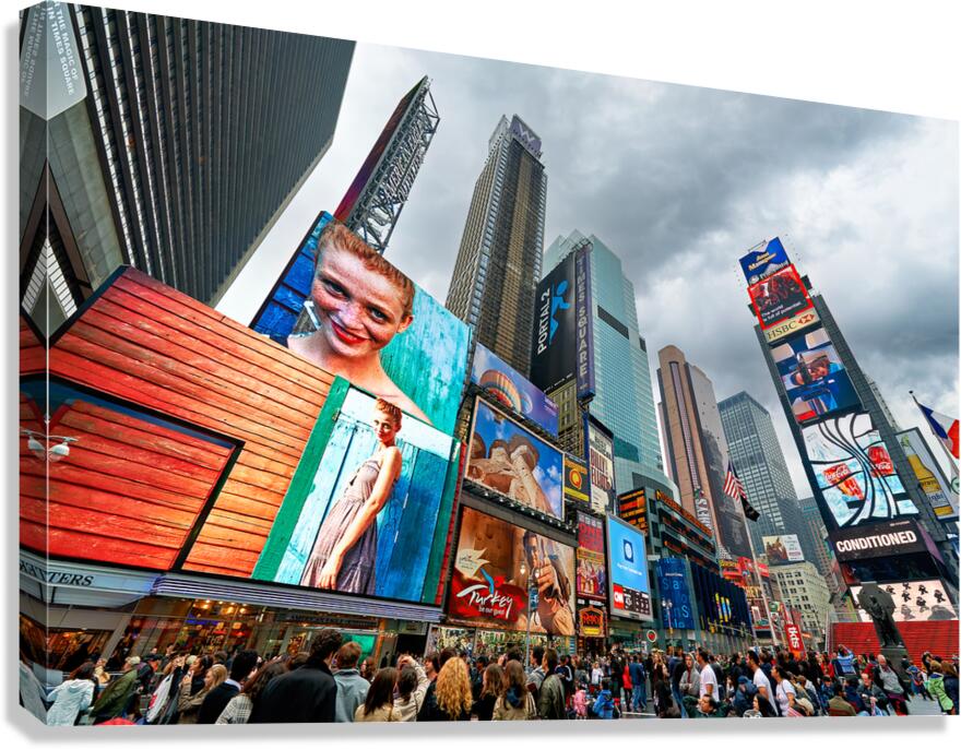 Crowd gathers in Times Square Manhattan during a cloudy day