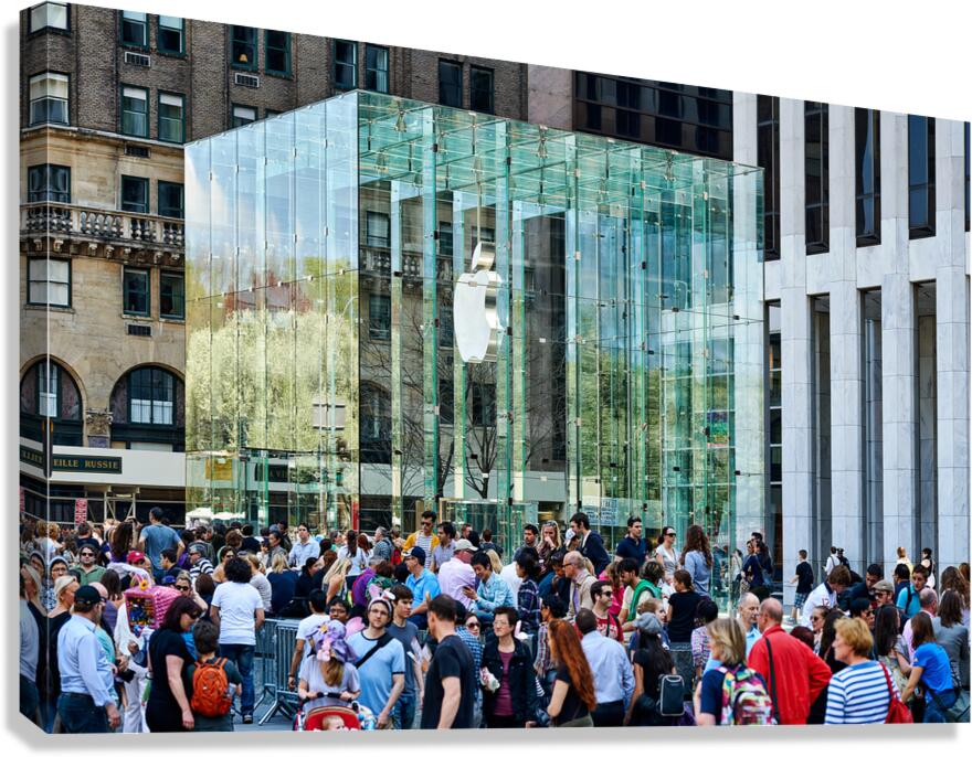 Many people visit the Apple Store at 5th Avenue in Manhattan