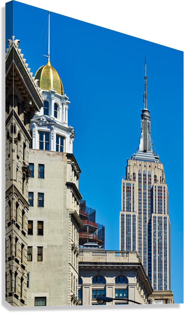 Empire State Building stands tall in Manhattan under clear blue 