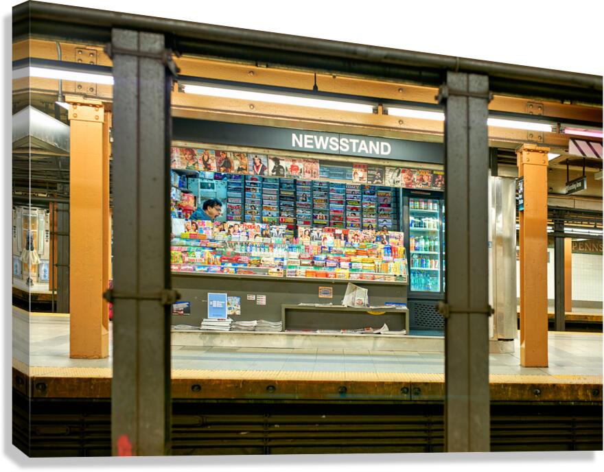 Newsagent yawning at newsstand in Manhattan subway station