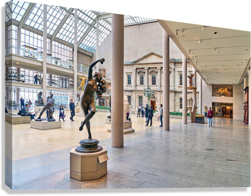 Visitors explore Engelhard Court at the American Wing in Manhatt